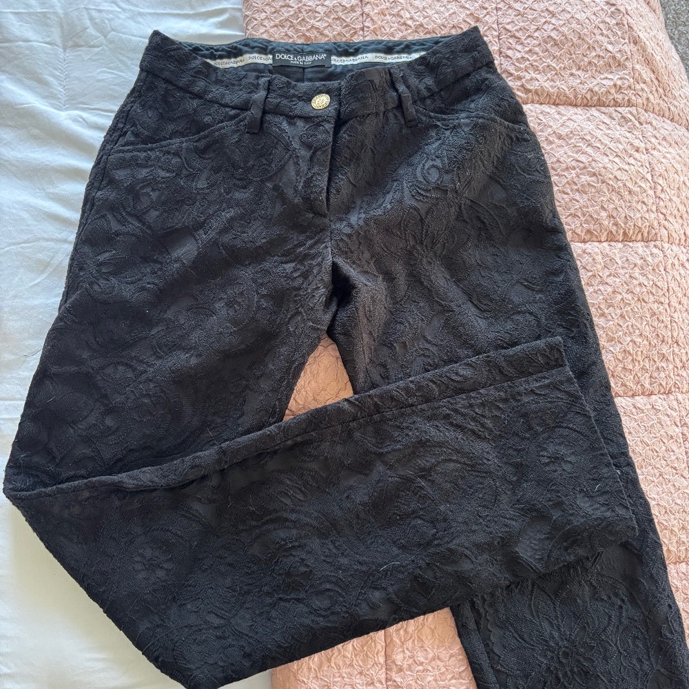 Dolce & Gabbana black lace-patterned pants.